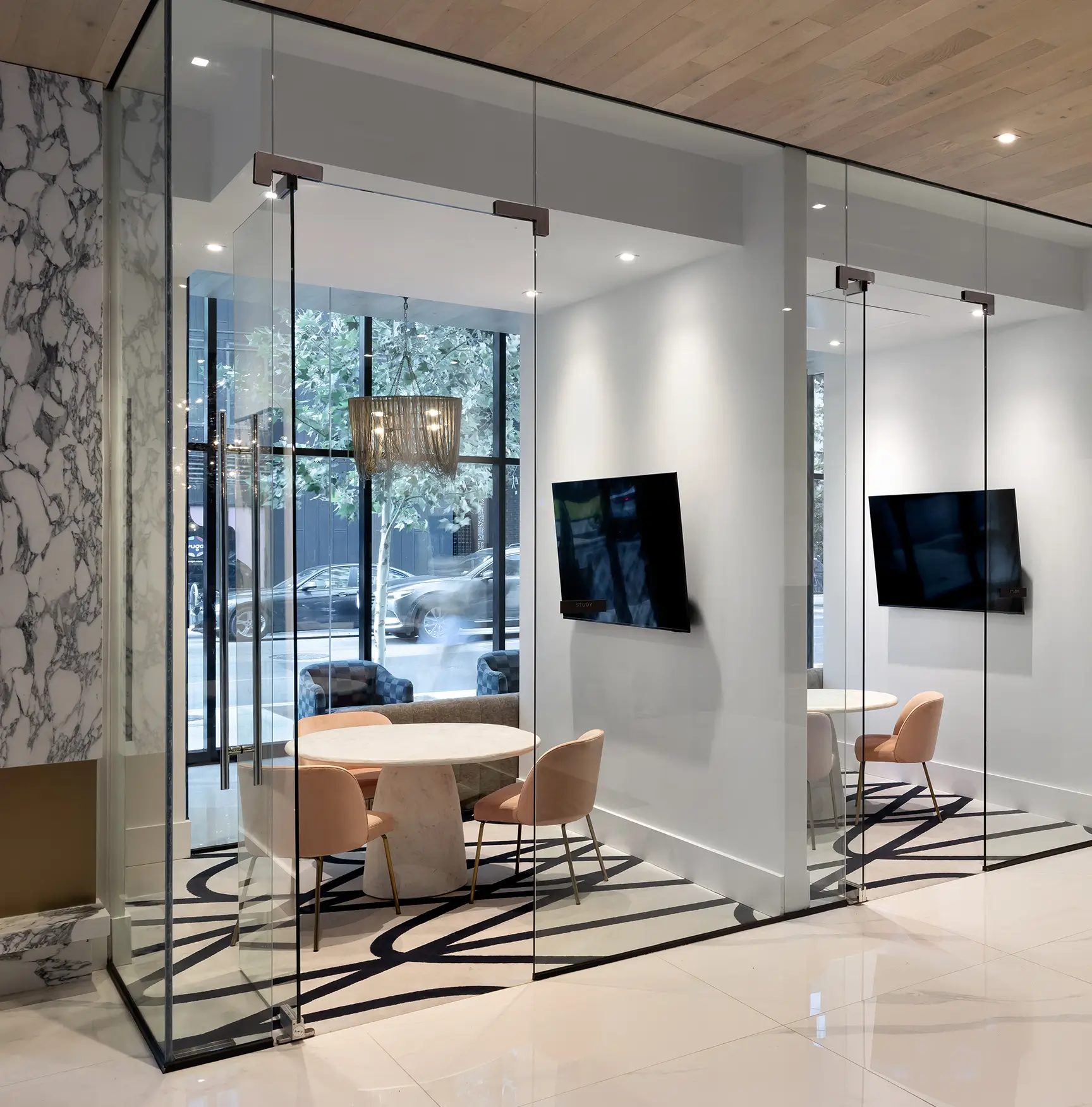 Room with table, chairs, and screen