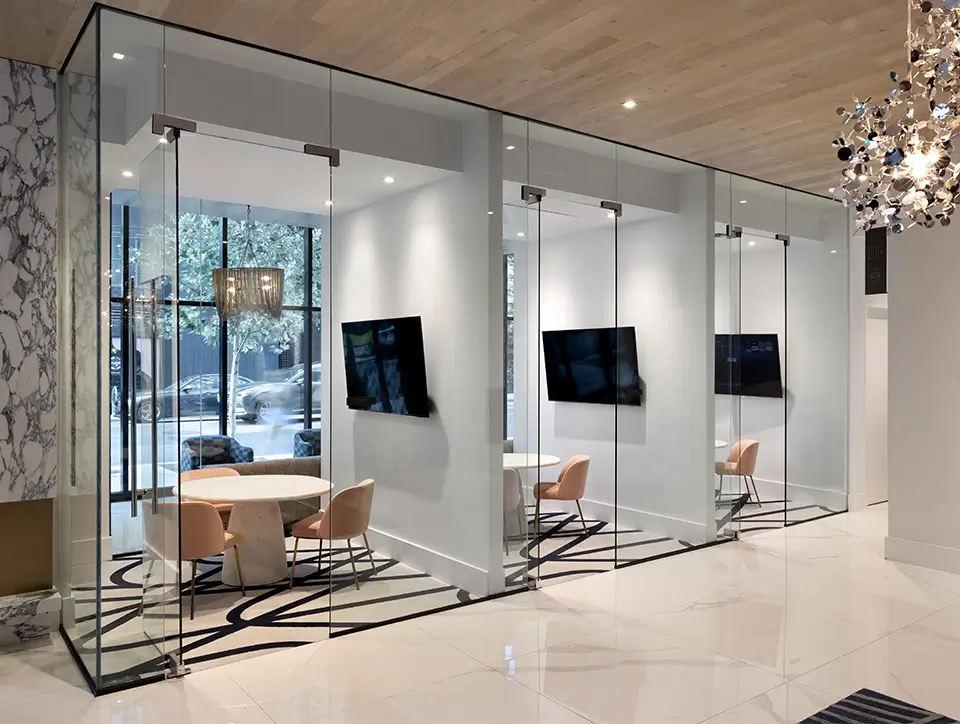 Room with table, chairs, and screen